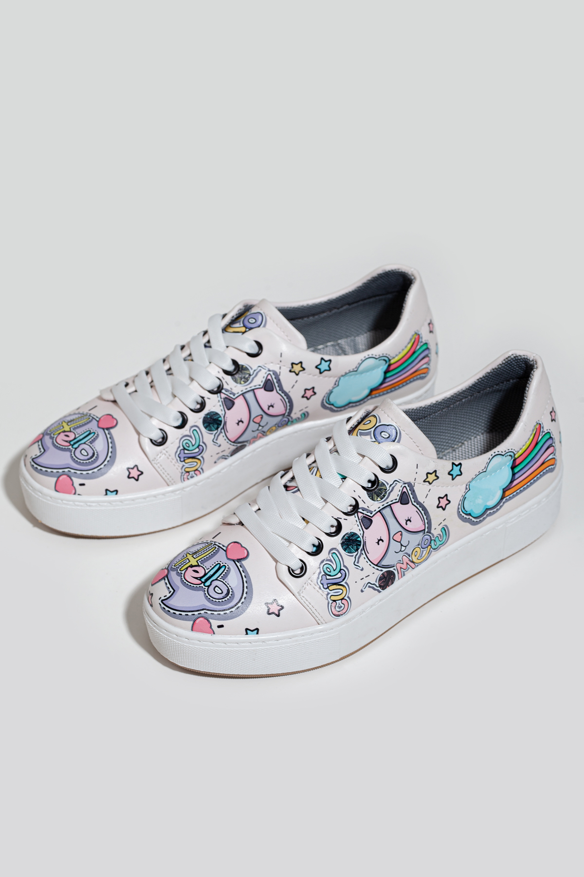 pink colored cat white thick sole sneakers
