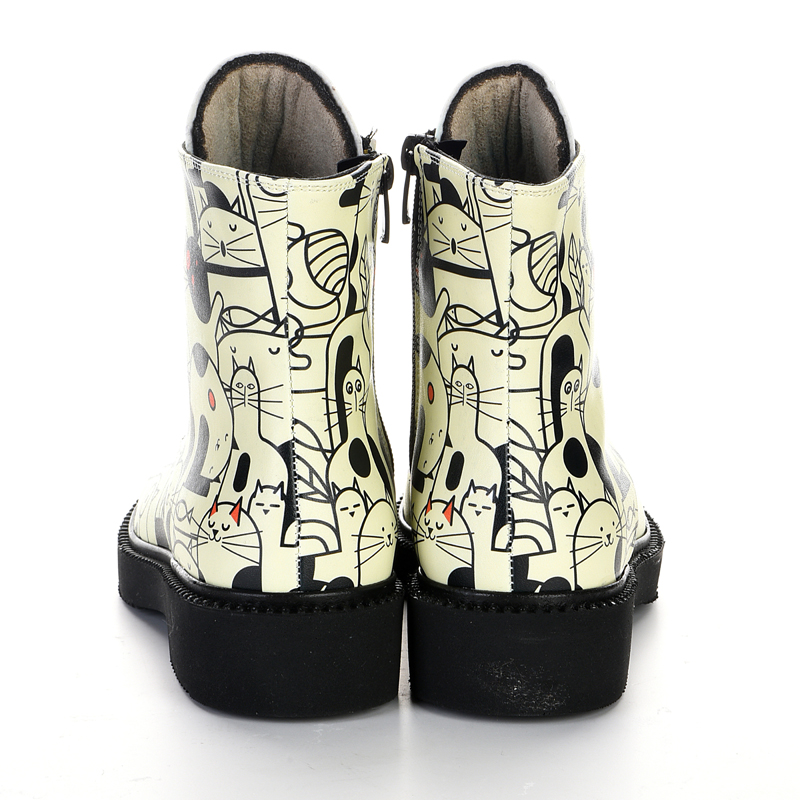 cream-colored cat-patterned lace-up boots