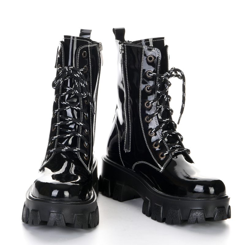 Black patent leather high-soled boots