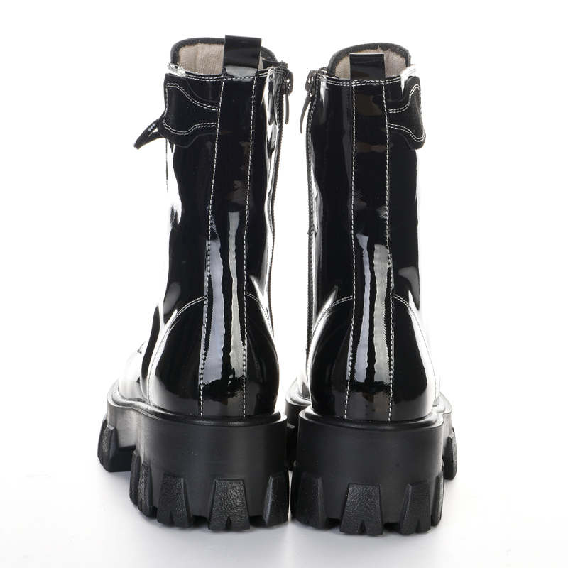 Black patent leather high-soled boots