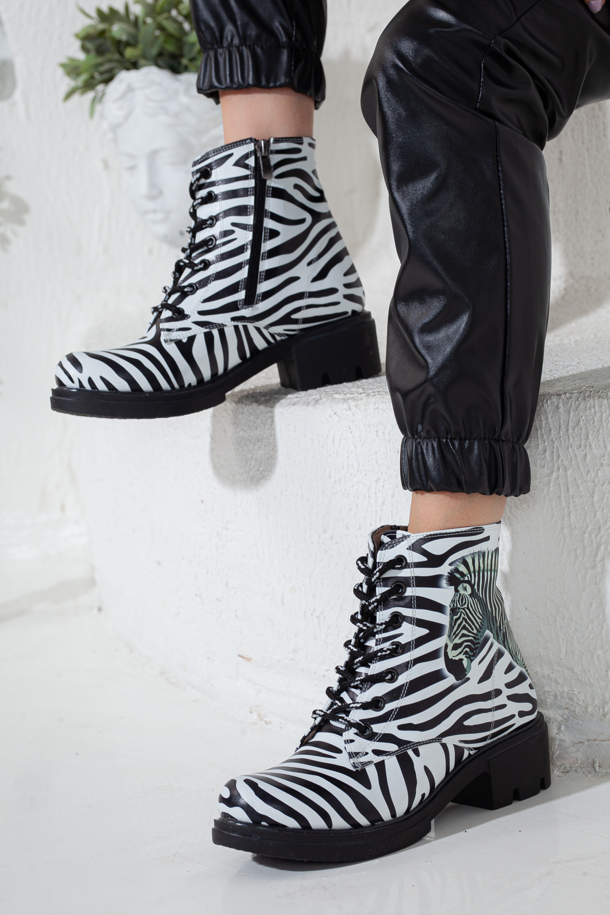 Zebra print chunky heeled boots