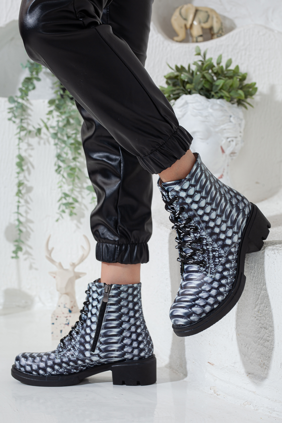 Cobra print black and white chunky heeled boots